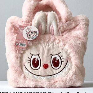 2 Totes! For the price of one!! Bundle of 2 Mokoko reversible totes. So cute!